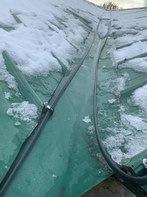 Heat Trace_ snow melting cable installed for roof valley for a property in Boston.