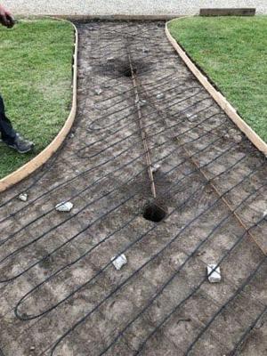 Concrete heat trace_ snow melting system using MI coper cable installed for a property in Red Deer Alberta Canada.